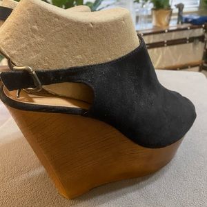 Black suede platform runs small fits like a 9